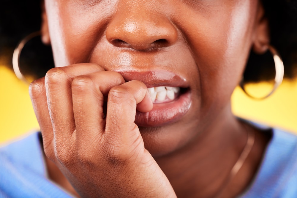 is biting your nails bad for your teeth